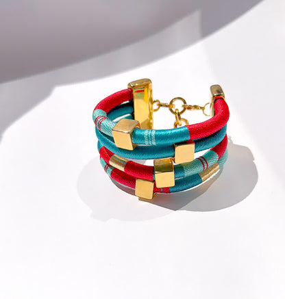 Brazalete Constelacion Orion Rojo turquesa