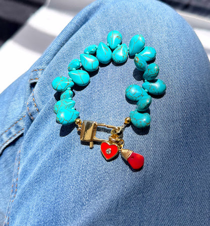 Pulsera Heliconia turquesa y rojo