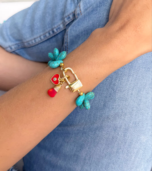 Pulsera Heliconia turquesa y rojo