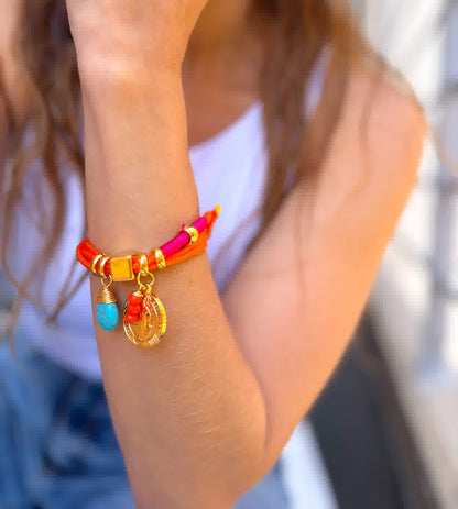 Pulsera Amuleto naranja fucsia dije de san benito