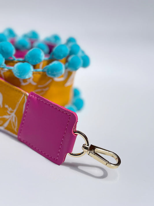 Asa Lona pompón Celeste y fuscia - Sara´s accesorios